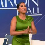Tamron’s green satin dress on Tamron Hall Show