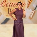 Tamron’s burgundy drape satin top and skirt on Tamron Hall Show Tamron’s burgundy drape satin top and skirt on Tamron Hall Show