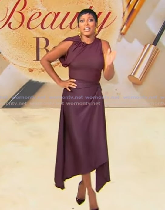Tamron's burgundy drape satin top and skirt on Tamron Hall Show