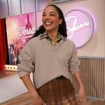 Tessa Thompson’s layered skirt and sweater on Sherri