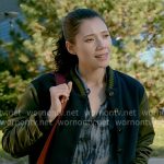 Violet’s tie-dye shirt and navy and green bomber jacket on Chicago Fire