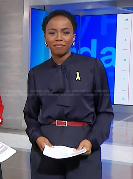Zinhle’s navy tie neck blouse on NBC News Daily