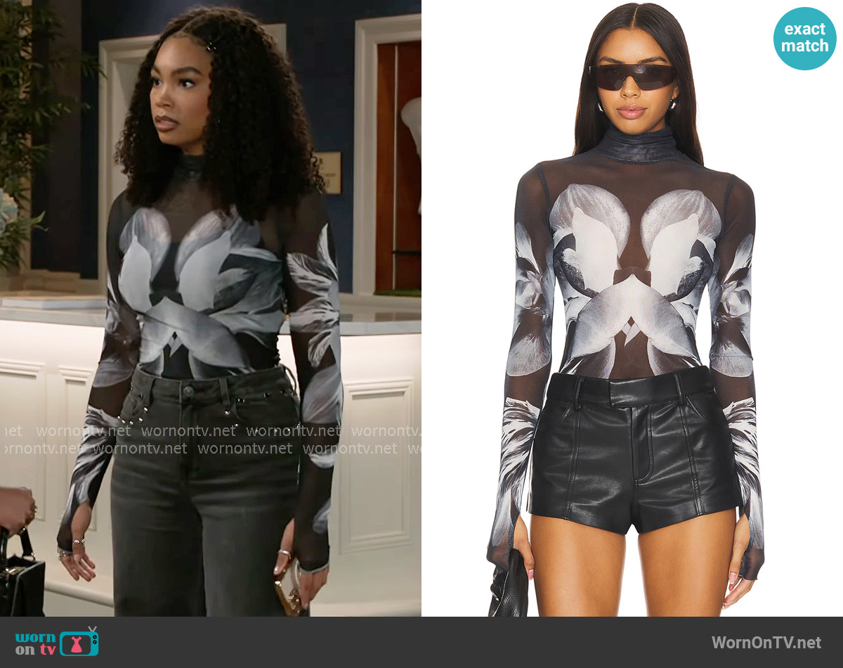 AFRM Zadie Top in Noir Botanical worn by Chelsea Hamilton (RhonniRose Mantilla) on Beyond the Gates