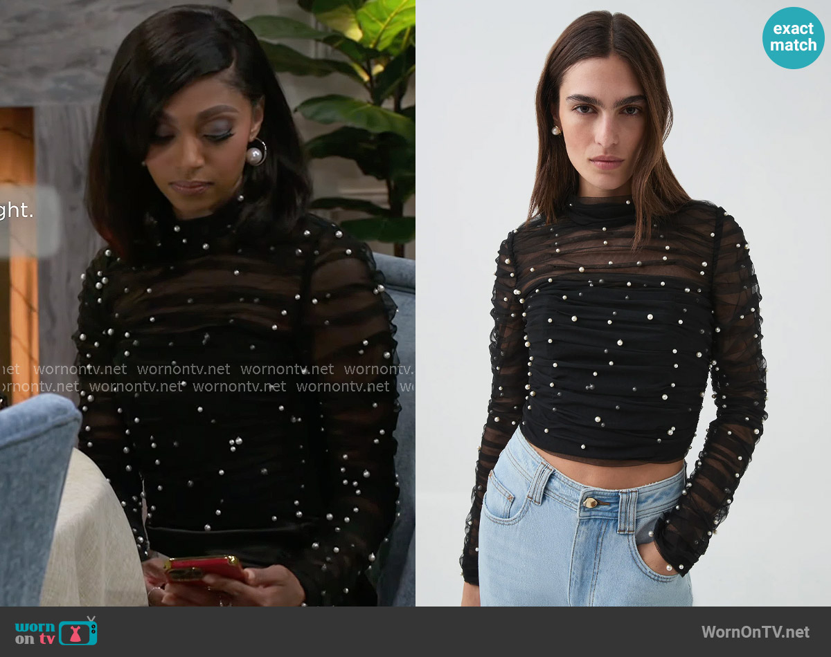 Aje Juniper Crop Top worn by Kat Richardson (Colby Muhammad) on Beyond the Gates