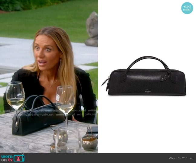 Alaia Teckel Leather Baguette Clutch in Noir worn by Dorit Kemsley on The Real Housewives of Beverly Hills
