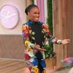 Amber Ruffin’s black floral print blouse and pants on Sherri