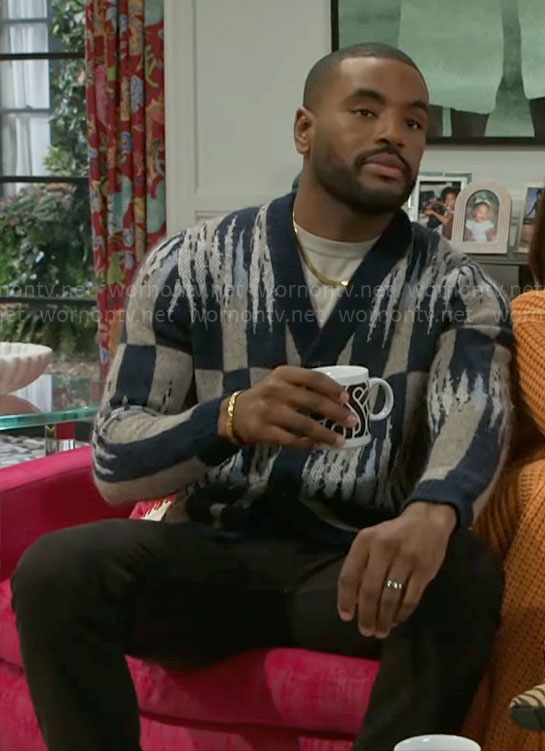 Andre’s navy and grey printed cardigan on Beyond the Gates
