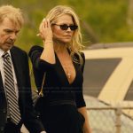 Angela’s black plunging neckline dress on Landman