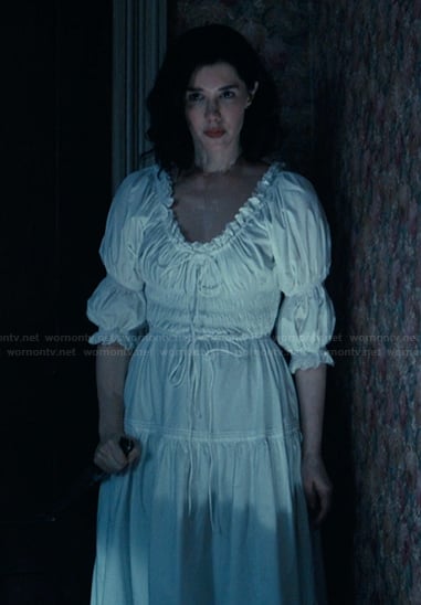 Betsy’s white ruffle trim dress on The Burbs