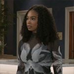 Chelsea’s black and white floral top with studded jeans on Beyond the Gates