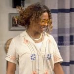Courtney’s floral embroidered shirt on The Neighborhood