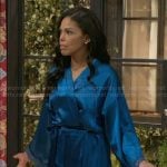 Dani’s blue satin robe with lace trim on Beyond the Gates