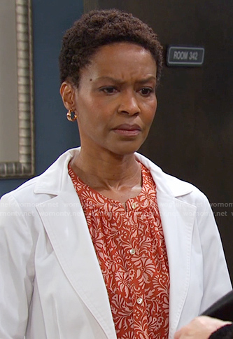 Dr. Gregory’s orange floral blouse on Days of our Lives