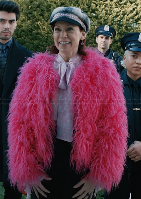 Elsbeth’s pink feather cardigan on Elsbeth