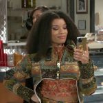 Eva’s patchwork print jacket and skirt set on Beyond the Gates