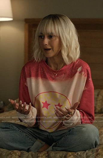 Jeanine’s pink smiley face print top on The Lincoln Lawyer