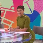 Jericka Duncan’s green button-shoulder dress on CBS Mornings