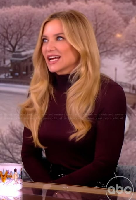 Jessica Capshaw’s burgundy turtleneck top and latex skirt on The View