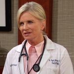 Kayla’s pink stripe collared sweater on Days of our Lives