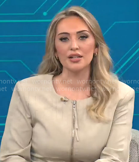 Kelly O’Grady’s beige zip up jacket on CBS Mornings
