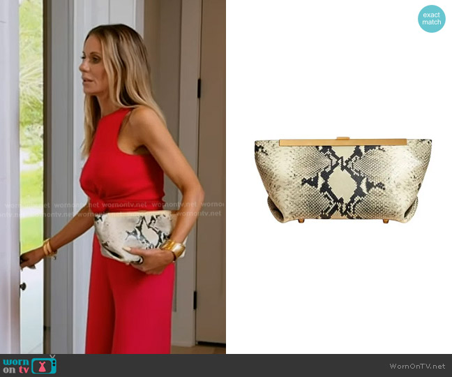 Khaite The Aimee Python-effect clutch Bag worn by Dorit Kemsley on The Real Housewives of Beverly Hills