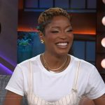 Kiki Palmer’s white pinstripe corset top and pants on The Kelly Clarkson Show
