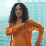 Anna’s orange sheer jacket on His & Hers