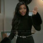 Lynette’s black fur cuff top on Beyond the Gates