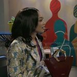 Madison’s floral coat on Beyond the Gates
