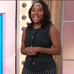 Makho Ndlovu’s black vest and pleated skirt on Sherri
