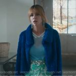 Morgan’s blue fur jacket, green printed mini skirt, and fish earrings on High Potential