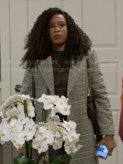 Naomi’s plaid coat on Beyond the Gates
