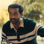 Naveen’s green rugby stripe sweater on The Burbs