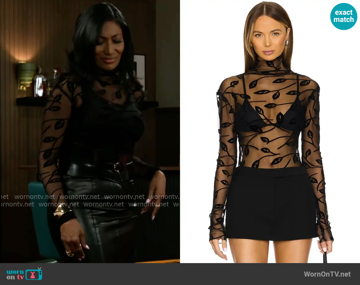 Norma Kamali Long Sleeve Turtleneck Top in Black Leaf worn by Dana 'Leslie' Thomas (Trisha Mann-Grant) on Beyond the Gates