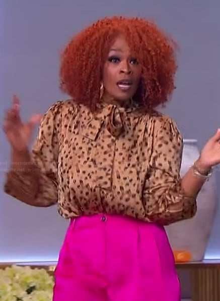 Olivia Crimmins’ leopard print tie neck blouse on The Jennifer Hudson Show