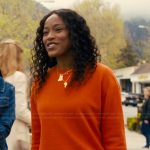 Samira’s orange sweater on The Burbs