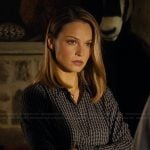Rebecca’s black chain link print blouse on Landman