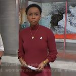 Zinhle’s red ribbed asymmetric sweater on NBC News Daily
