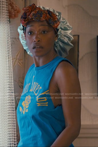 Samira’s blue rose print tank top on The Burbs