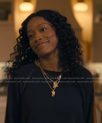 Samira’s gold Egyptian pendant necklace on The Burbs