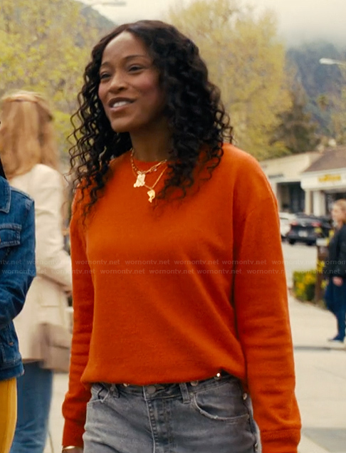 Samira’s orange sweater on The Burbs