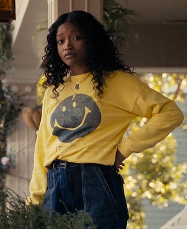 Samira’s yellow smiley face sweatshirt on The Burbs