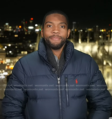 Shaquille Brewster’s navy down jacket on NBC News Daily