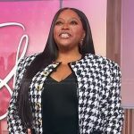 Sherri’s houndstooth tweed jacket and skirt on Sherri