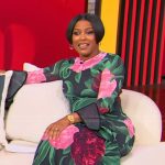 Tamron’s black floral print long sleeve dress on Tamron Hall Show