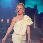 Tara Lipinski’s yellow ruffle one shoulder mini dress on The Jennifer Hudson Show