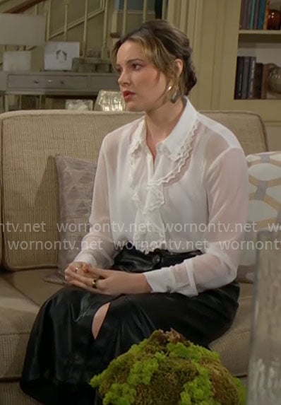 Tessa’s white ruffle blouse on The Young and the Restless