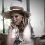 Amanda’s white floral v-neck dress on The Real Housewives of Beverly Hills
