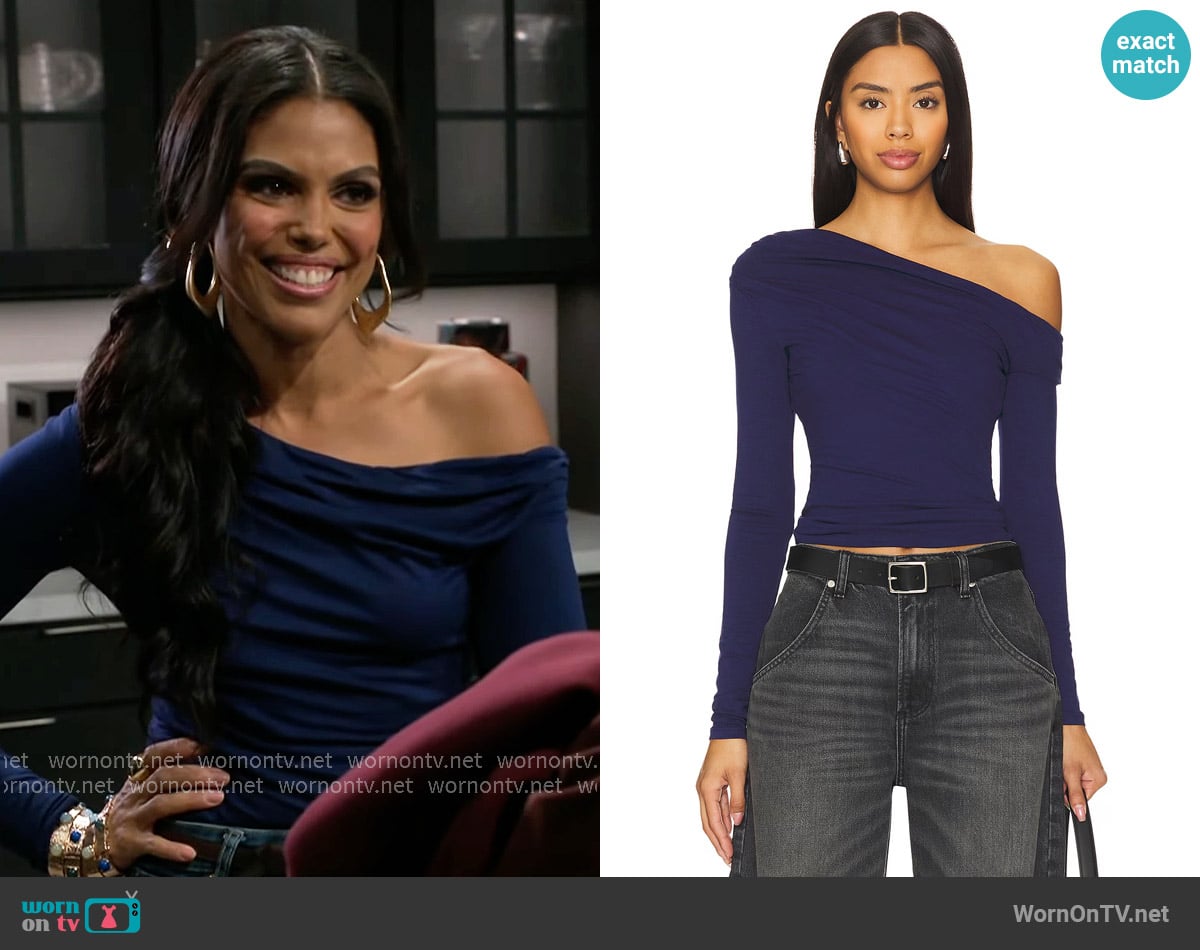 AFRM Bria Top in Bright Navy worn by Dani Dupree (Karla Mosley) on Beyond the Gates
