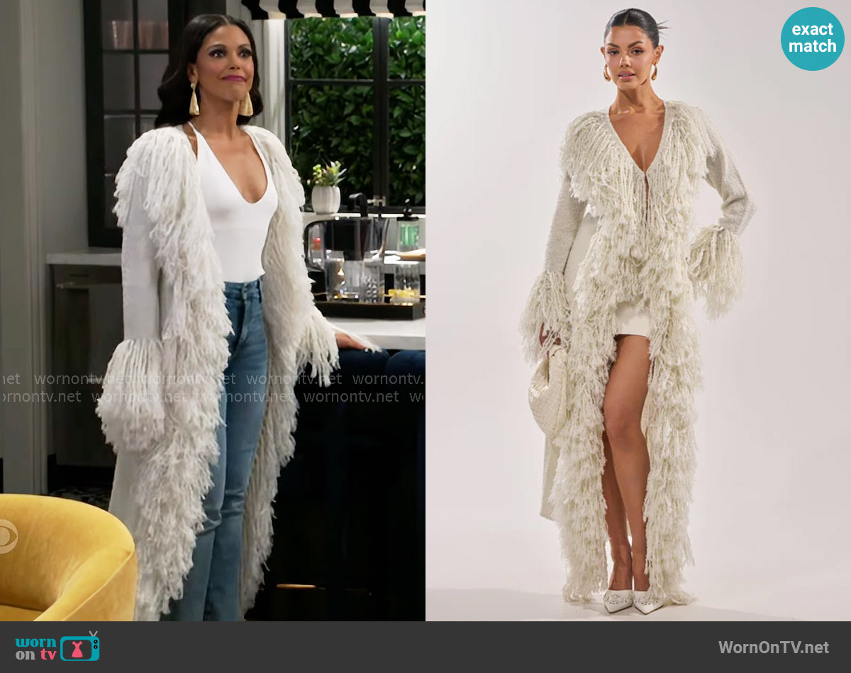 Akira Burr It's Cold Outside Fringe Oversized Sweater in Ivory worn by Dani Dupree (Karla Mosley) on Beyond the Gates